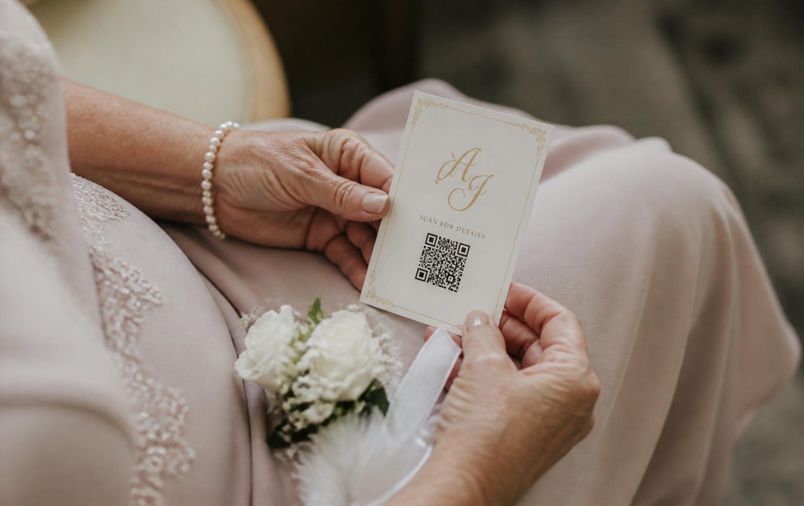Three generations of wedding guests each holding a smartphone naturally at a candlelit wedding reception